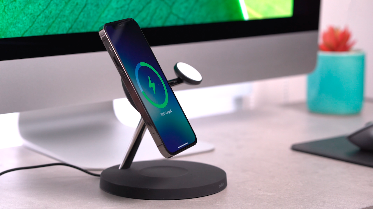 Belkin Boost Series wireless charger with smartphone on desk
