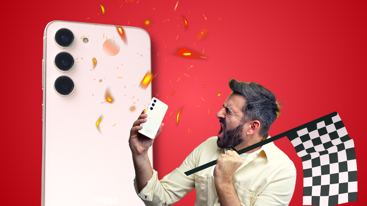Man celebrating victory with Samsung Galaxy S23, holding a checkered flag against a red background.