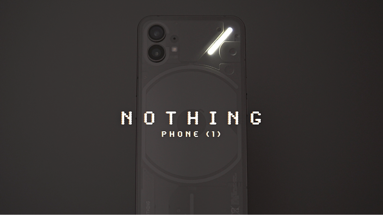 Nothing Phone (1) with illuminated back panel, showcasing sleek design and dual camera setup on a dark background.