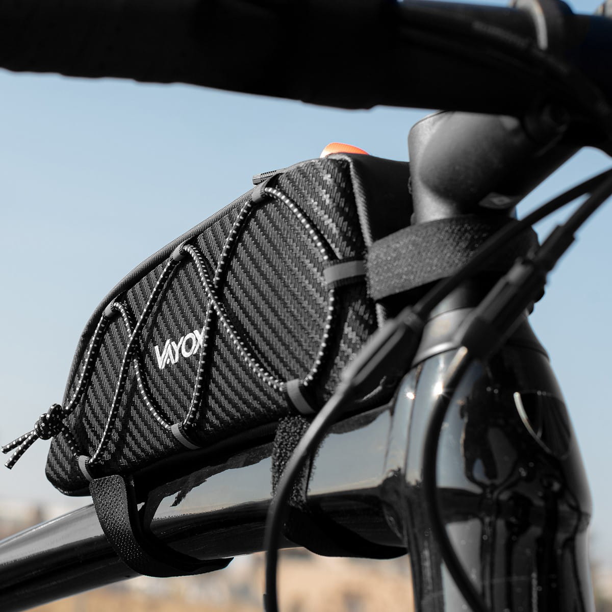 Vayox VA0347 black bike frame bag, 1L capacity, securely attached to bicycle frame with durable straps, ideal for carrying essentials.