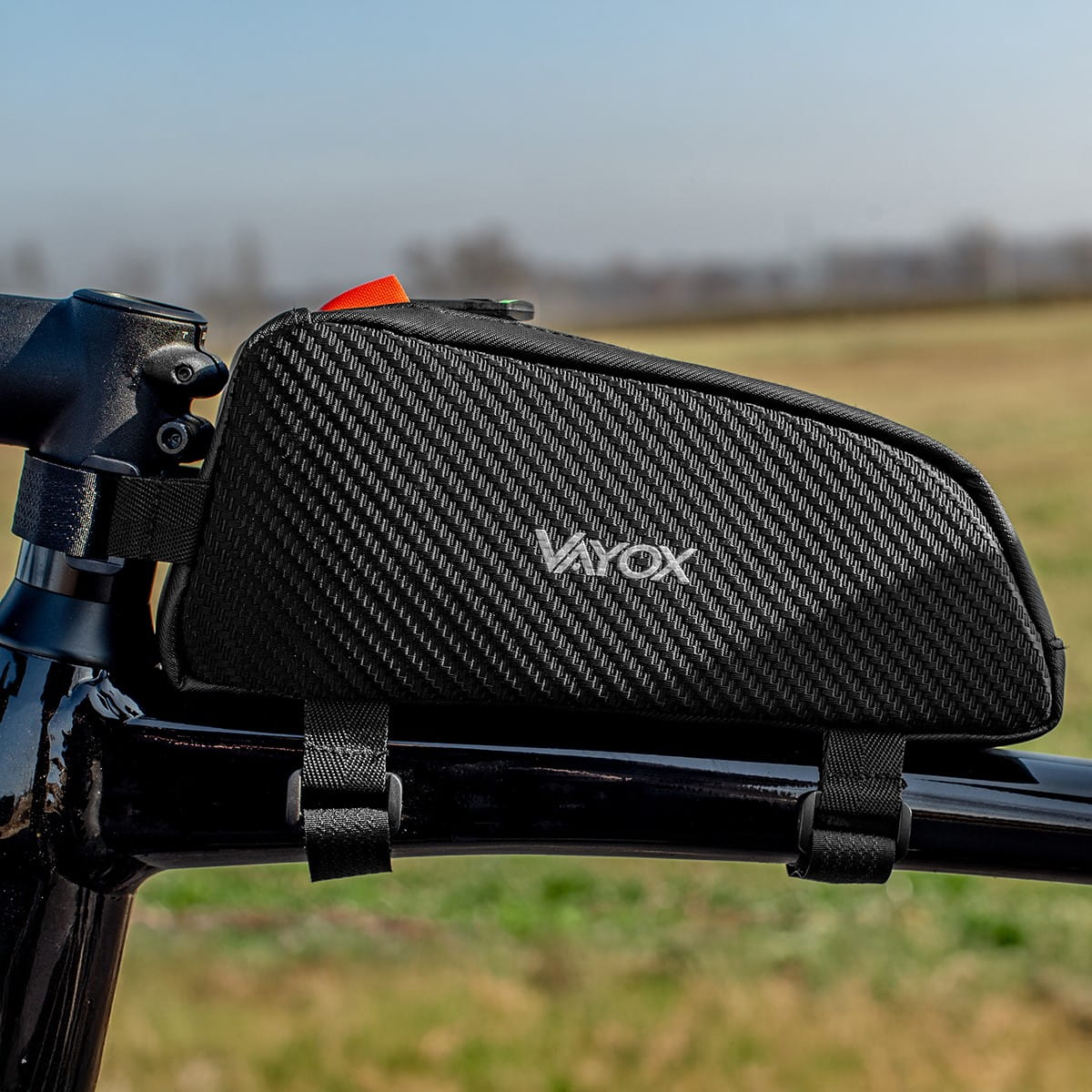 Vayox VA0347 1L black bike frame bag attached to bicycle, compact and durable for essentials, ideal for cycling trips.