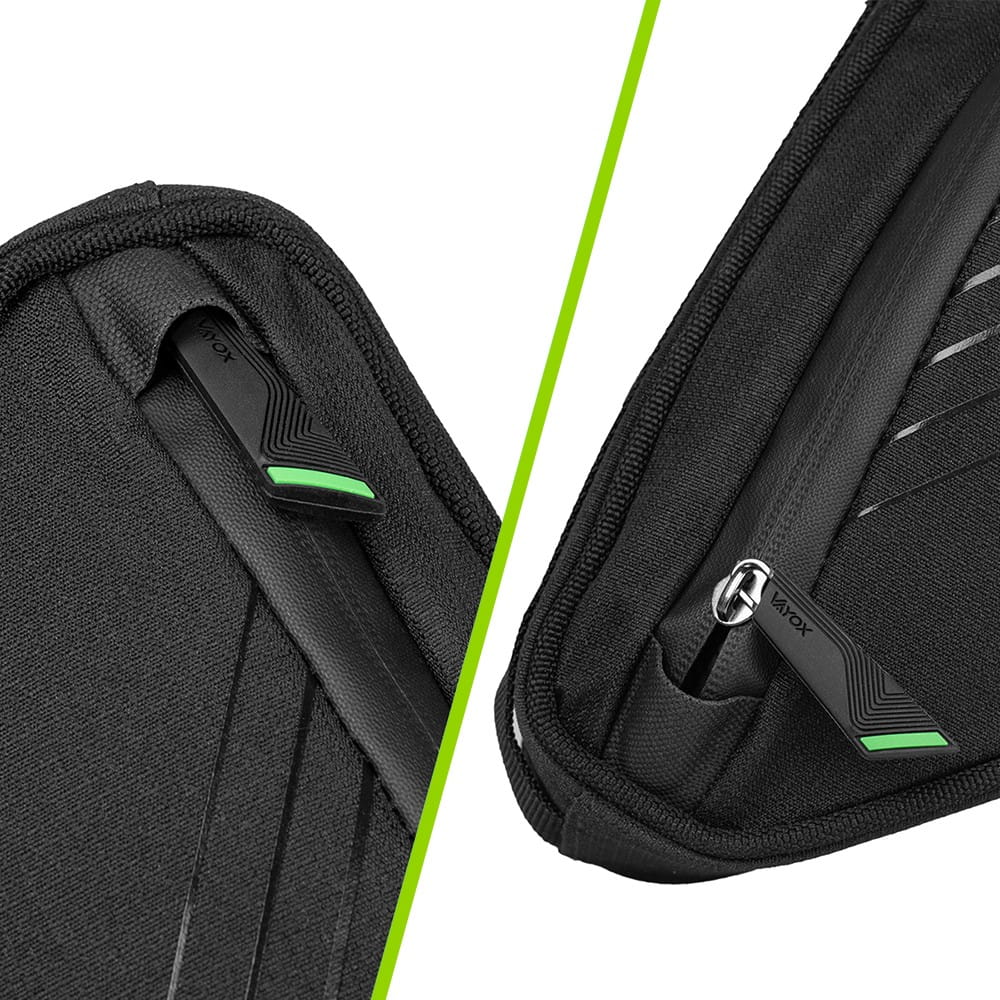 Close-up of black Vayox VA0348 bike frame bag with green zipper accents, showcasing durable material and design details.
