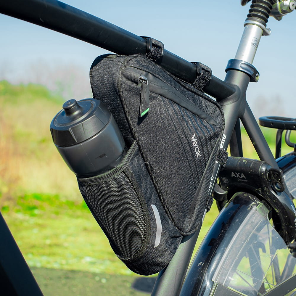 Vayox VA0348 black bike frame bag with bottle holder attached to bicycle under sunlight