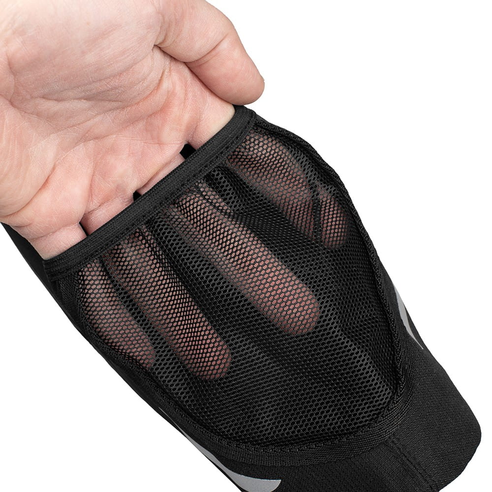 Close-up of hand holding Vayox VA0348 frame bag with mesh bottle holder, black color, practical for cycling accessories.