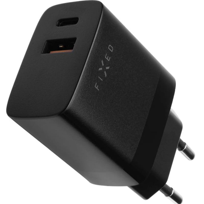 Schwarzes Fixed Travel Charger Ladegerät mit USB-C / USB-A Anschlüssen, 20W PD, ideal für Smartphones, Tablets und MagSafe, kompakte Bauweise.